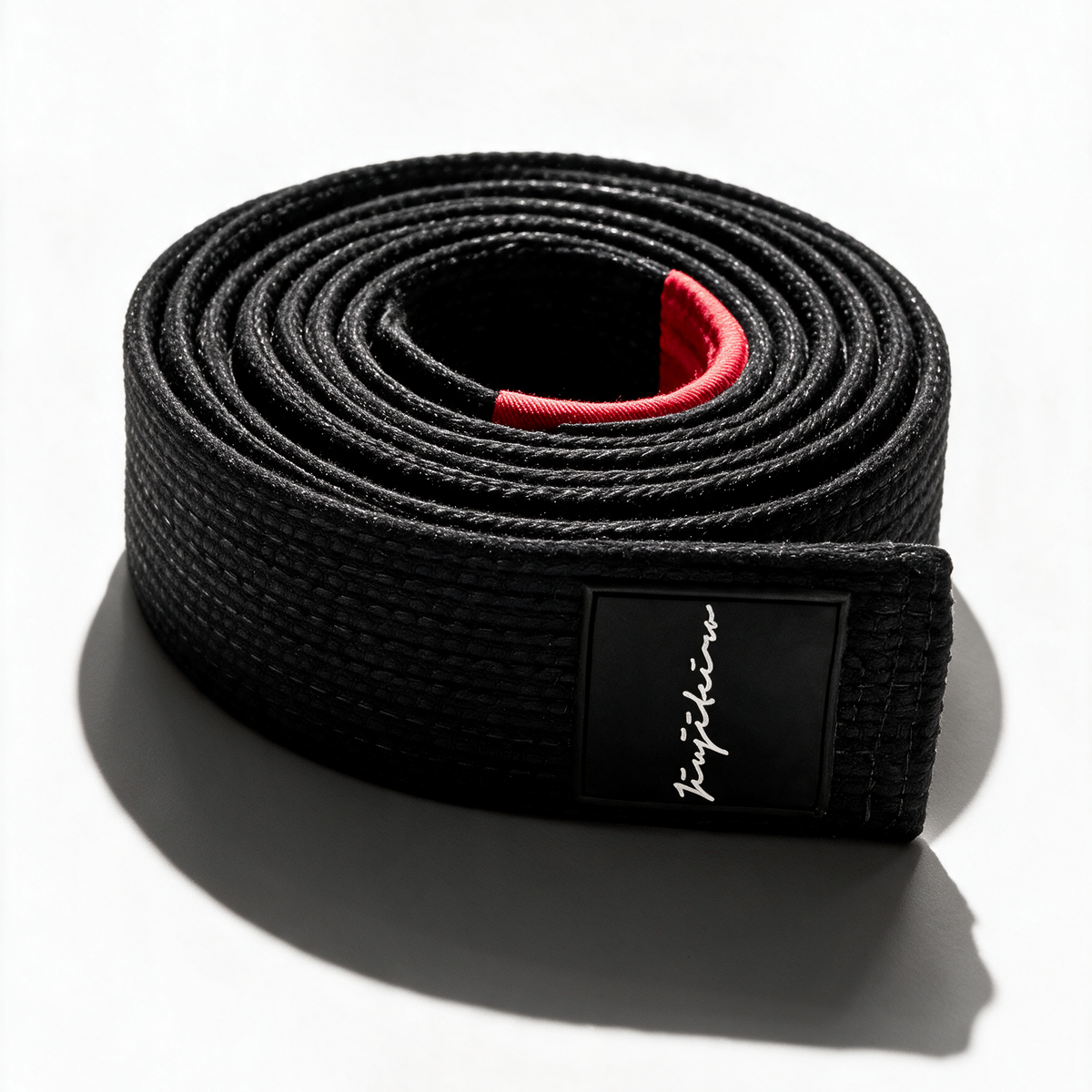 Black Pro Belt with a red rank bar and Jiujiteiro label