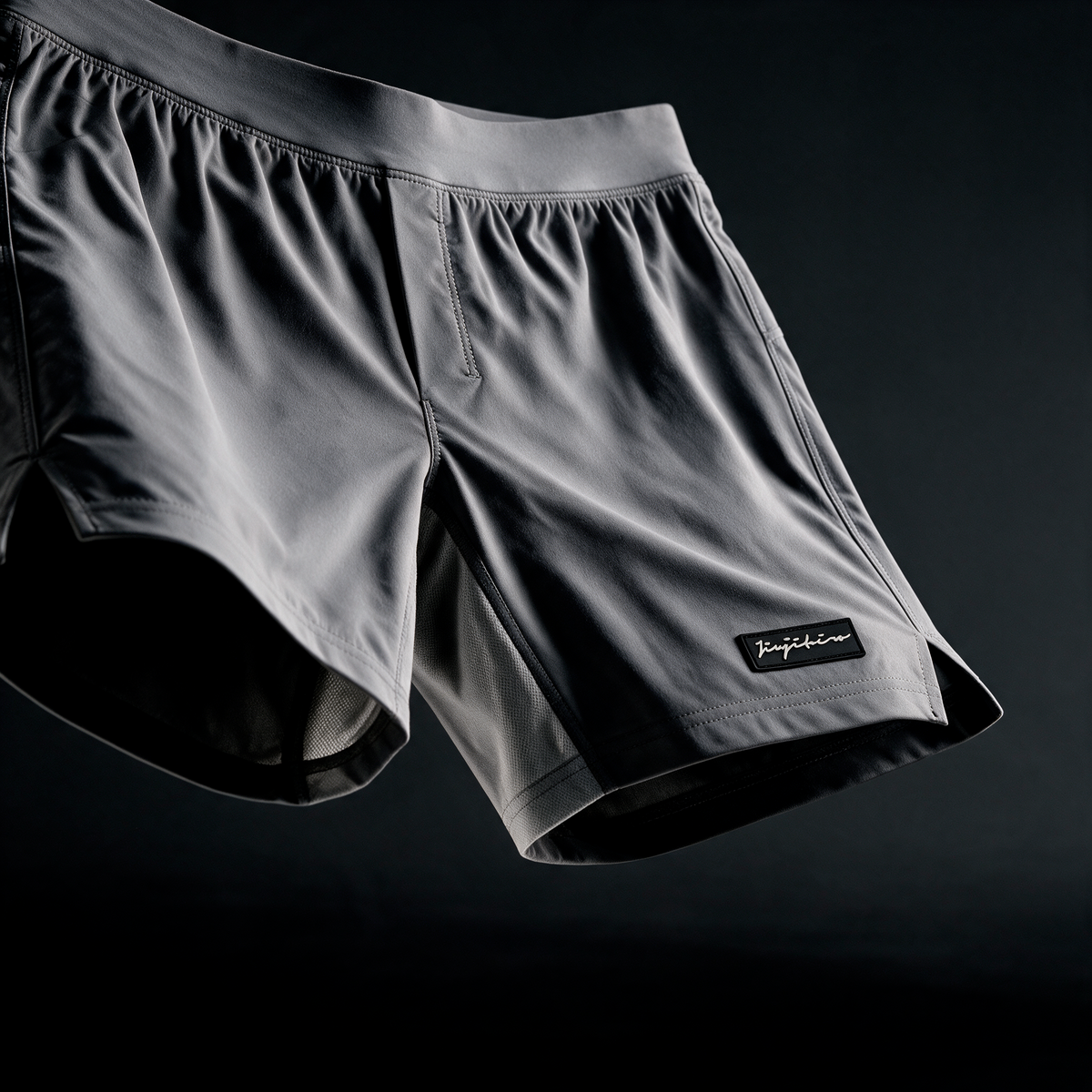 Grey no-gi shorts fabric and Jiujiteiro logo detail